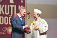 Former German President Christian Wulff (L) with Turkey's Presidency of Religious Affairs head Mehmet Gu00f6rmez in Cologne, Germany.