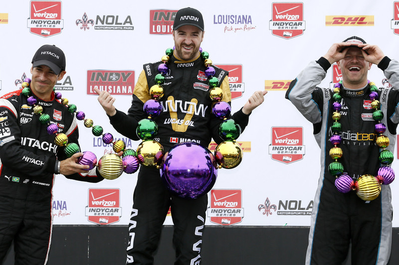 Winner James Hinchcliffe, center, of Canada, runner up Helio Castroneves, left, of Brazil, and third place finisher James Jakes, of England  AP Photo
