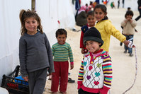 Syrian refugee children, who fled violence in Syria, seen outside their tent in Turkeyu2019s newly set-up camp in the border town of Suruc, on Jan. 30, 2015 (AP Photo)
