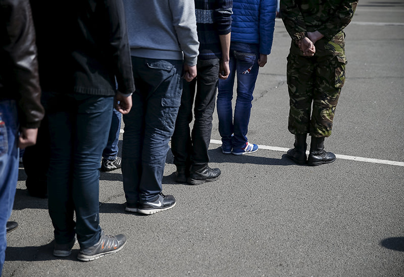 Ukrainian conscripts line up during a ceremony marking the first batch of conscripts in the Ukrainian army at the parade square of a recruitment office in Kiev, April 16, 2015 (Reuters Photo)