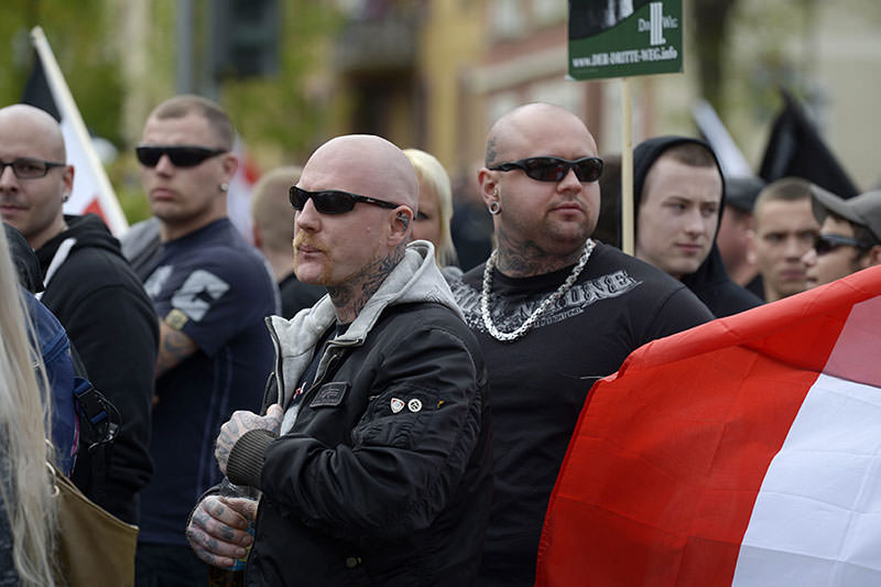 Participants in a march organized by the right-wing extremist group 'Der dritte Weg' (lit. the third way) walk through Saalfeld, Germany, 01 May 2015 (EPA Photo)