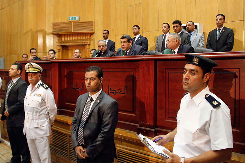 Egyptian Judge Shaaban el-Shami, center, sentences ousted Egyptian President Mohammed Morsi to death (AP Photo)