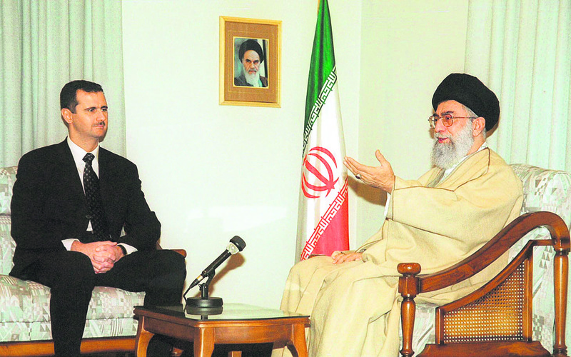In this file photo, Iran's supreme leader Ayatollah Ali Khamenei holds a meeting with Syrian President Bashar Assad.