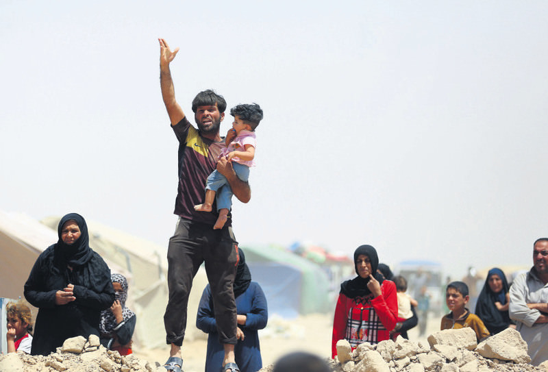A Ramadi resident fleeing from ISIS shouts at Iraqi officials who refuse to let them leave the outskirts of the city.