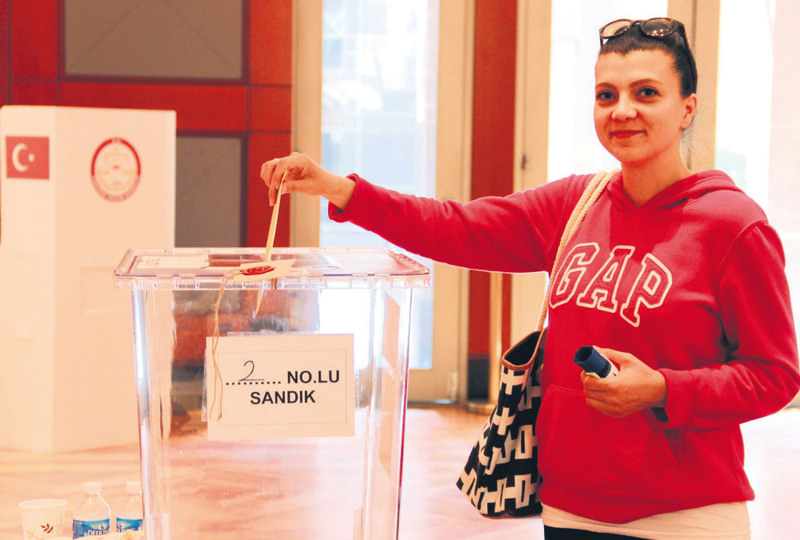 A Turkish citizen in Washington casts her vote.