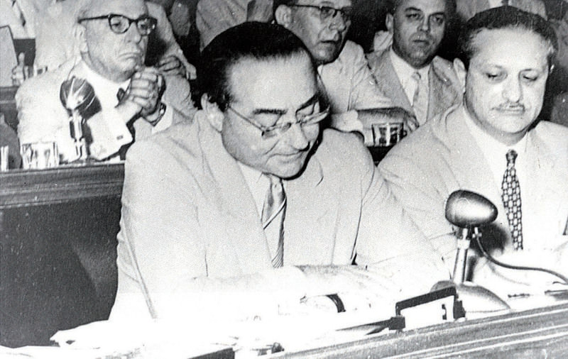 Adnan Menderes (L)reading his defense during his trial at a courtroom on Yassu0131ada island. He was hanged by the coup court in 1961.