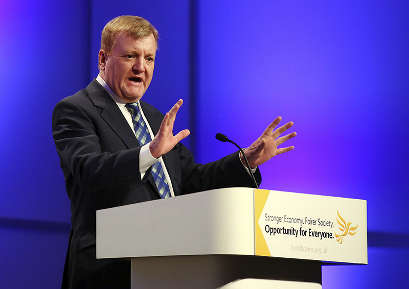 In this March 20, 2015 file photo former Liberal Democrat leader Charles Kennedy gestures as he speaks at a meeting (AP Photo)