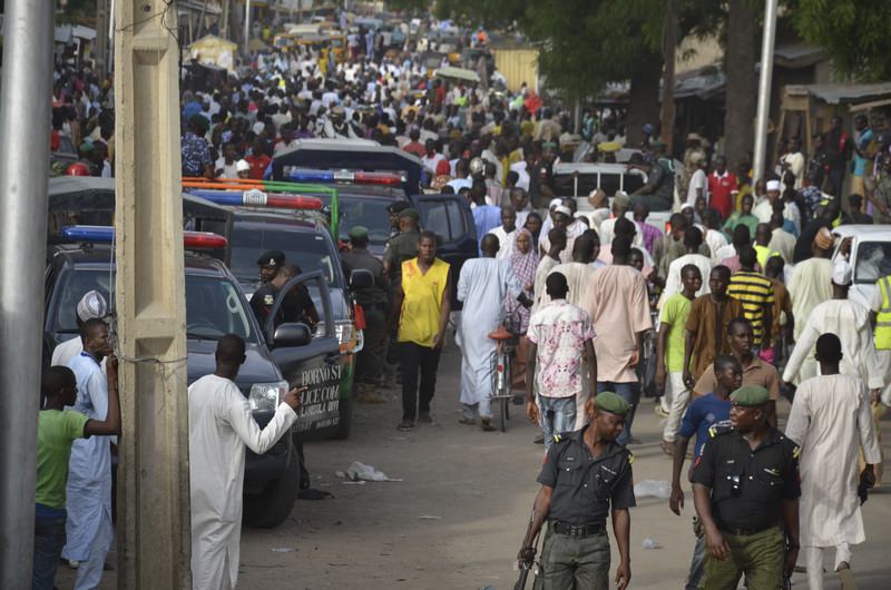 People throng the streets near the site of another explosion in Maiduguri, Nigeria, Saturday, May 30, 2015 (AP Photo)