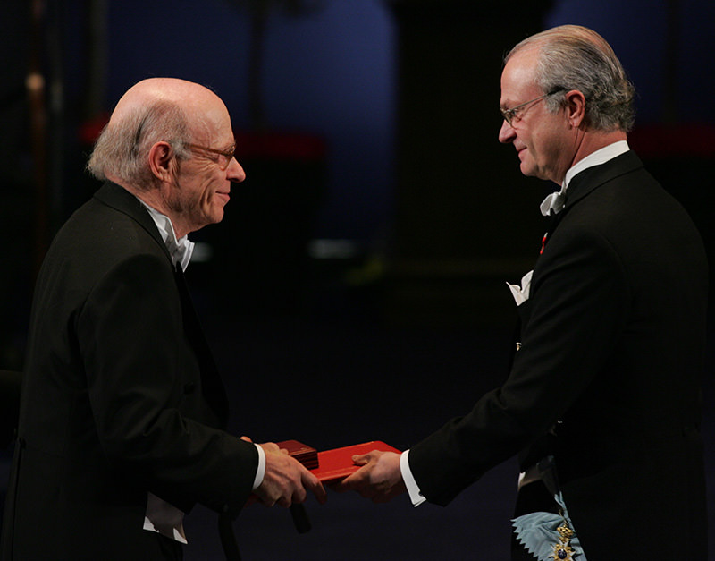In this Friday, Dec. 10, 2004 file photo Irwin Rose of the U.S., left, receives the Nobel Prize in Chemistry from King Carl Gustaf of Sweden, right, during a ceremony at the Concert Hall in Stockholm, Sweden (AP Photo)