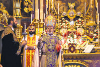 Archbishop Aram Ateu015fyan (center), acting head of the patriarchate, presiding over a religious service at Surp Asdvadzadzin church in Istanbul on April 25.