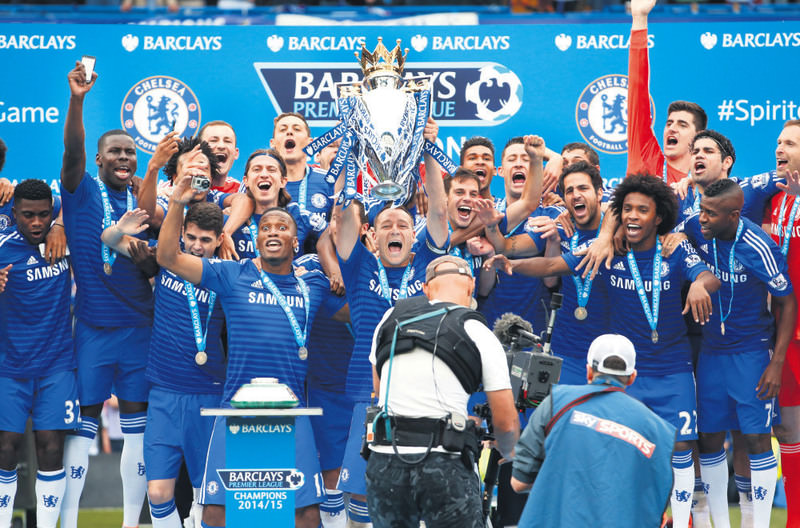 Chelsea's John Terry celebrates with the trophy and teammates after winning the Barclays Premier League. No  English clubs reached the quarter-finals of the Champions League, but they are still the envy of the continent.