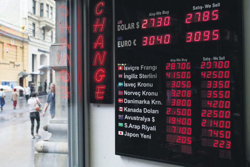 A currency exchange office in Istanbul, Monday, June 8. The Turkish currency yesterday dropped to a record low against the dollar over political uncertainty, trading at TL 2.8 to the dollar.