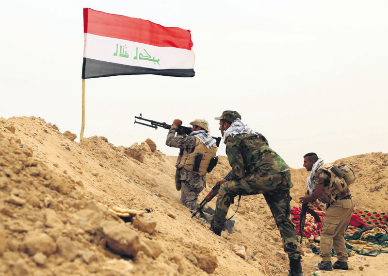 Iranian-backed Shiite militias fighting against ISIS militants.