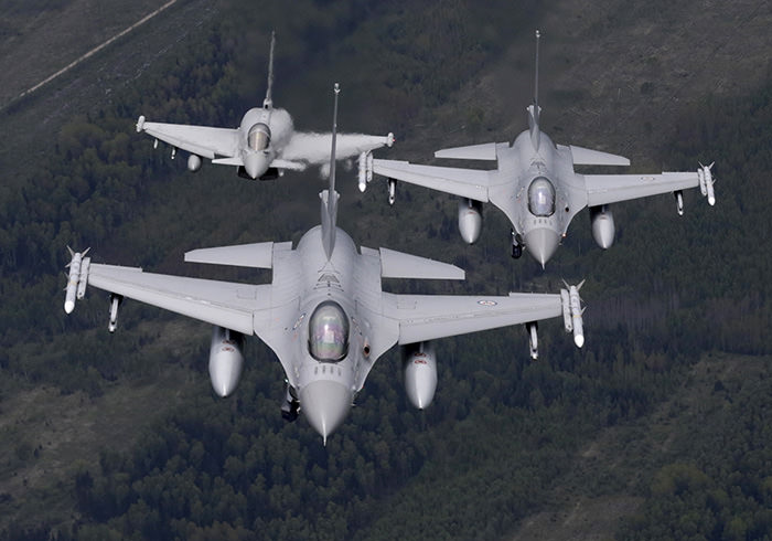 Norway's Air Force F-16 fighters (front) and Italy's Air Force Eurofighter Typhoon fighter patrol over the Baltics during a NATO air policing mission from Zokniai air base near Siauliai, Lithuania, May 20, 2015 (Reuters Photo)