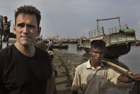 American actor Matt Dillon, left, stands with a Rohingiya man at Thay Chaung harbor, north of Sittwe in the western state of Rakhine, Myanmar (AP Photo)