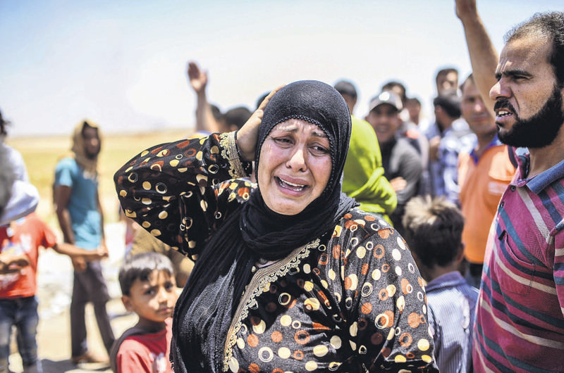 Civilians from Tal Abyad are fleeing the clashes between ISIS and the PKK-linked PYD. Turkey fears the PYD is exploiting the chaos to change the ethnic make-up of the region.