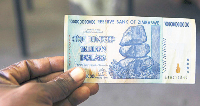 Zimbabweans get $5 for 175 quadrillion local dollars