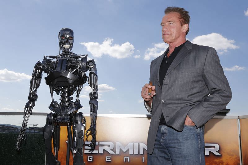 Actor Arnold Schwarzenegger poses for photographers at a preview of his new film, 'Terminator: Genisys', in Paris, France, June 19, 2015. (AP Photo