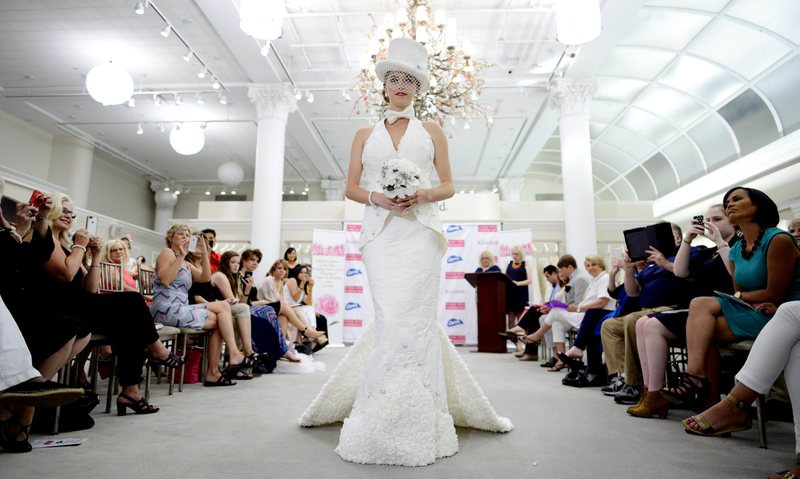 Model Aubrey Swander walks the runway in a dress, which won first place and was designed by Donna Pope Vincler, of Brentwood, Tennessee, during the 11th annual Toilet Paper Wedding Dress contest in New York. (EPA Photo)
