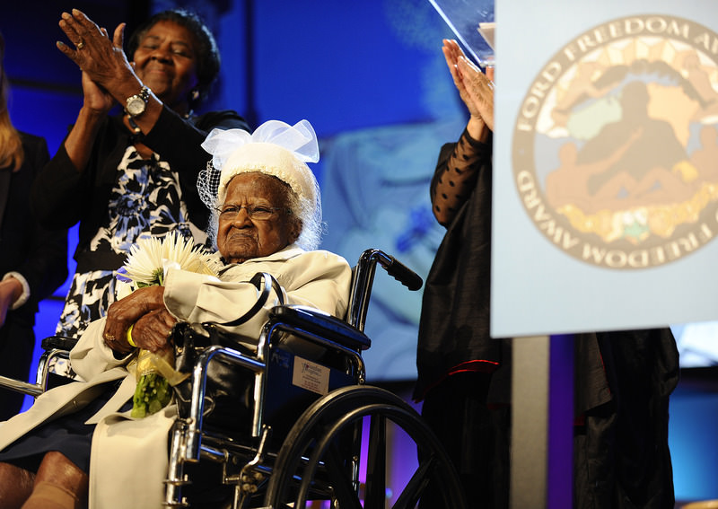 This photo taken May 5, 2015, shows Jeralean Talley, of Inkster, Mich., getting a round of applause after being introduced during the Ford Freedom Award Ceremony in Detroit. (AP Photo)