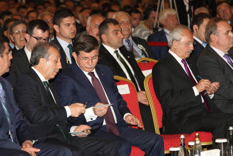 PM Ahmet Davutou011flu, (C) and CHP leader Kemal Ku0131lu0131u00e7darou011flu (R) attending the 26th general congress of Turkish Union of Agricultural Chambers (TZOB).