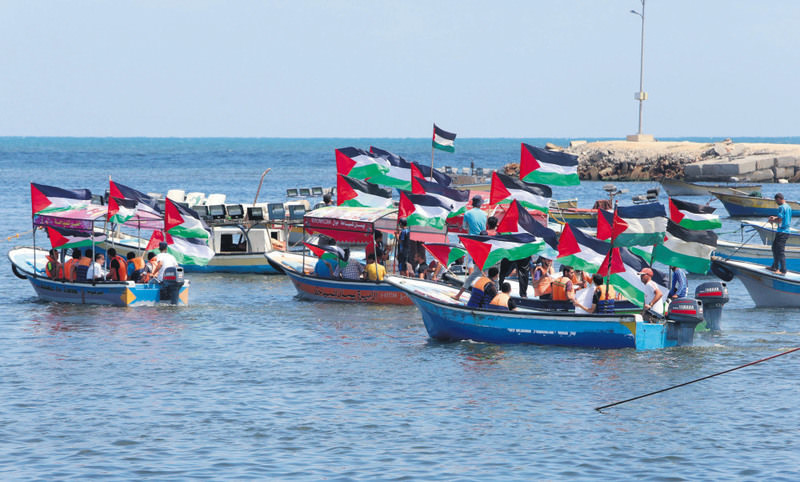 Gazan fishers were waiting to welcome the freedom flotilla in the coast.