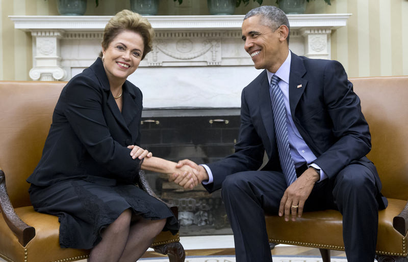 resident Barack Obama shakes hands with Brazilian President Dilma Rousseff in the Oval Office of the White House in Washington, Tuesday, June 30, 2015.  (AP Photo)