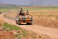 An armored vehicle patrolling along the Turkish border.