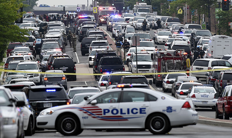 Police vehicles are seen near the Washington Navy Yard in Washington, Thursday, July 2, 2015 (AP Photo)