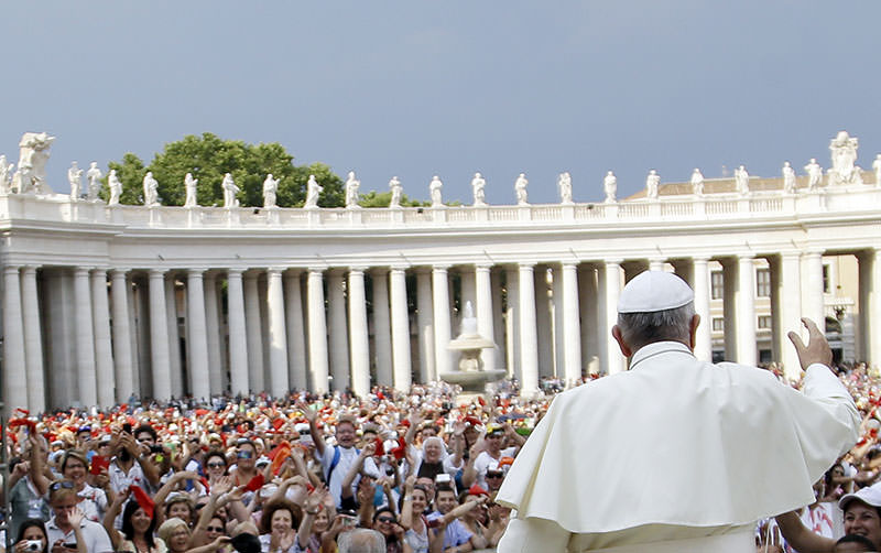 Pope Francis arrives for a meeting with faithful of the Holy Spirit movement in St. Peter's Square at the Vatican, Friday, July 3, 2015 (AP Photo)