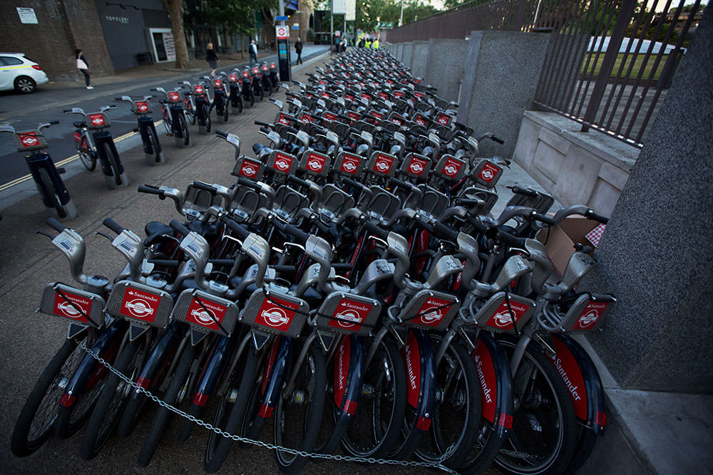 During a 24 hour London underground train strike, a stockpile of hire cycles from a city bike-sharing scheme stand ready at the start of the morning rush hour in London, Thursday, July 9 (AP Photo)