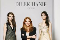 Dilek Hanif (C), the first Turkish fashion designer admitted to the official Paris Haute Couture Week.