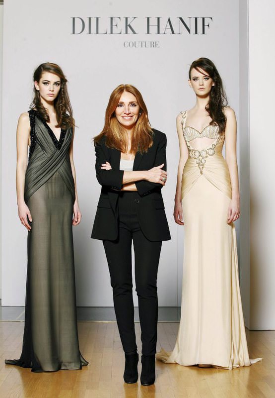 Dilek Hanif (C), the first Turkish fashion designer admitted to the official Paris Haute Couture Week.