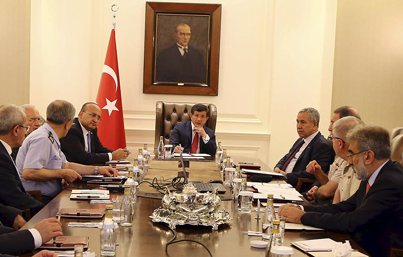 Turkey's Prime Minister Ahmet Davutou011flu (C) chairs a security meeting in Ankara, Turkey, in this July 25, 2015 handout provided by Turkey's Prime Minister's Press Office (Reuters photo)