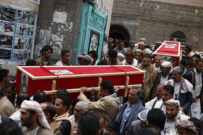 Shiite rebels known as Houthis carry the coffins of fellow Houthis, who were killed in a recent a car bomb attack, in Sanaa (AP Photo)