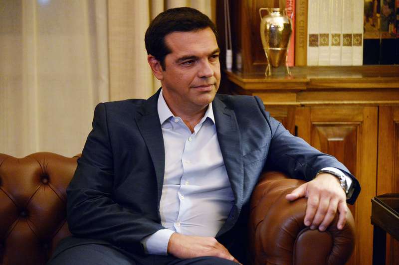 Greek Prime Minister Alexis Tsipras presents his resignation to the Greek president (unseen) at the presidental palace in Athens on August 20, 2015. (AFP Photo)