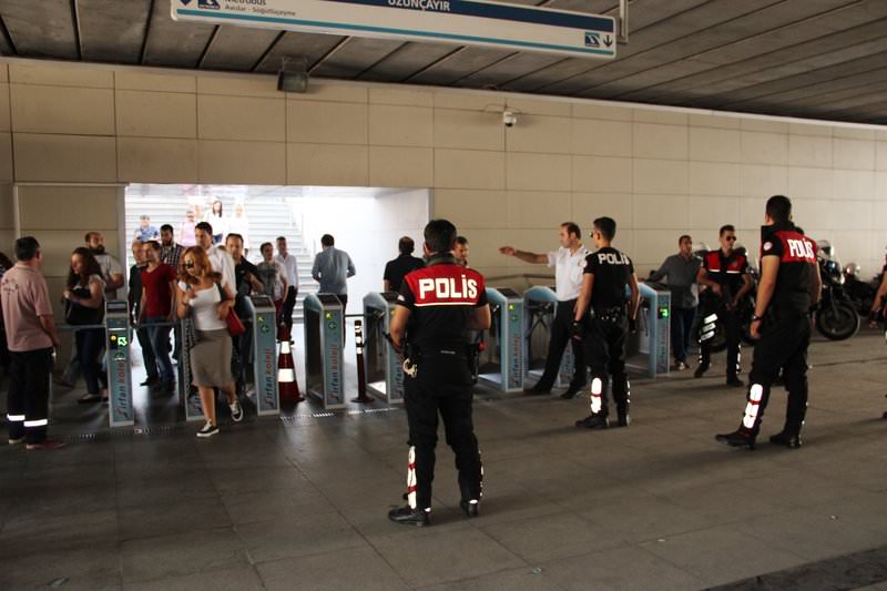 Turkish police doing a criminal record check in Istanbul Uzunçayır metrobus station on August 26, 2015. (IHA Photo)