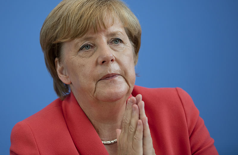 German Chancellor Angela Merkel gestures during her annual summer news conference in Berlin, Germany, Monday, Aug. 31, 2015. (AP Photo)