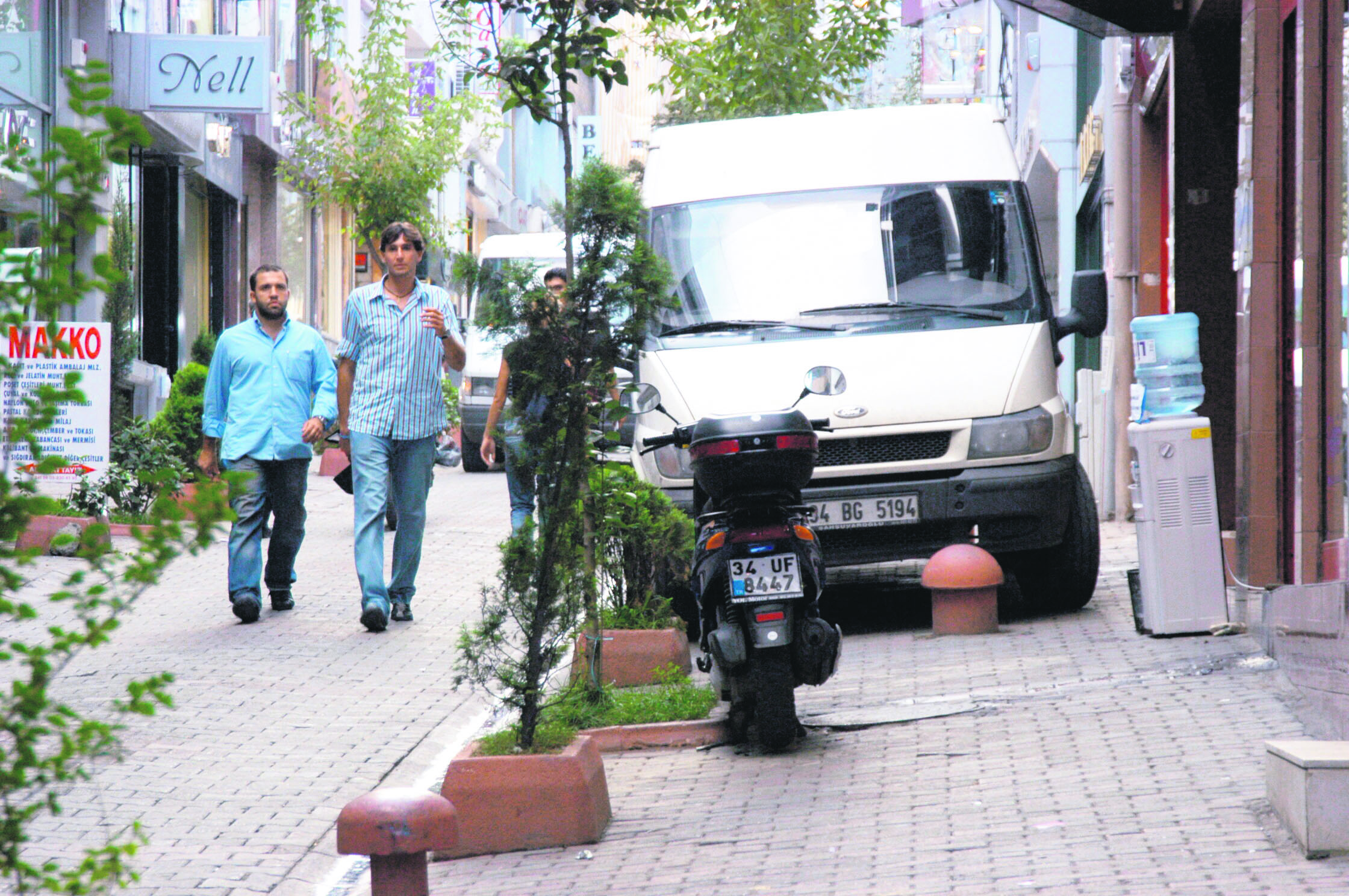 Uneven pavements and cars parked on sidewalks create problems in Istanbul.