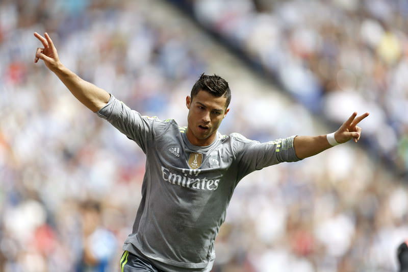Cristiano Ronaldo celebrates his first goal during the Primera Division match against Espanyol, 12 September 2015. (EPA Photo)