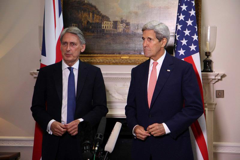 U.K. Foreign Secretary Philip Hammond (L) and U.S. Secretary of State John Kerry (R) held a meeting on Saturday.