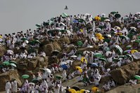 Muslim pilgrims pray on Mount Mercy on the plains of Arafat during the annual hajj pilgrimage, outside the Islamic holy city of Mecca.