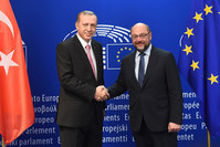 President Erdou011fan (L) shakes hands with European Parliament President Schulz at European Parliament in Brussel on Monday. (AFP Photo)