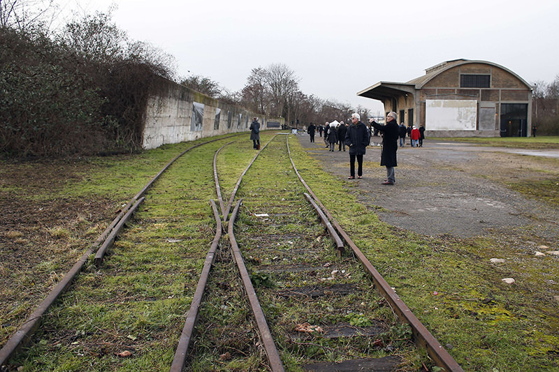 This January 27, 2015 file photo shows people as they attend the inauguration of the renovated goods shed of a former train station in Bobigny, north-east of Paris (AFP Photo)