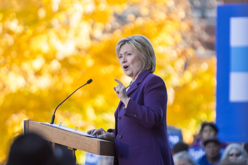 Democratic presidential candidate Hillary Clinton speaks on stage during a rally after filing paperwork for the New Hampshire primary at the State House on November 9, 2015. (AFP Photo) 