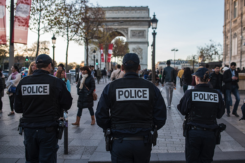 French police officers patrol on the Champs Elysees in Paris, Sunday, Nov. 15, 2015 (AP photo)