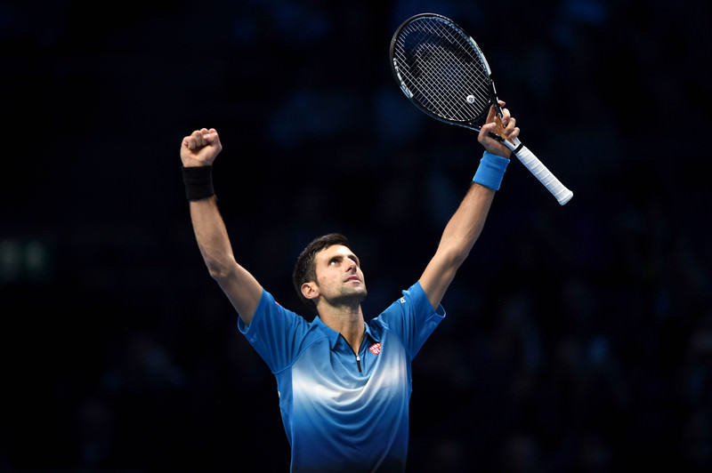 erbia's Novak Djokovic celebrates following his two set win over Spain's Rafael Nadal during their semi final match at the ATP Tour tennis finals. (EPA Photo)