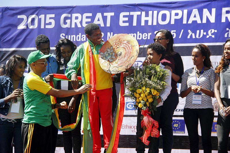 Gebrselassie received a plaque and made a speech following the event. (AA Photo)