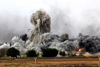 A file photo shows the moments immediately after a US-led airstrike on Daesh positions. (AFP Photo)