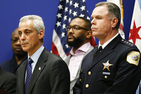 Chicago police superintendent Garry McCarthy (Right) standing with Chicago Mayor Rahm Emanuel (L)
